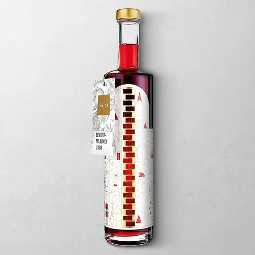 Wajos Adventskalender Flasche – gefüllt mit Gewürzpflaumen Likör
