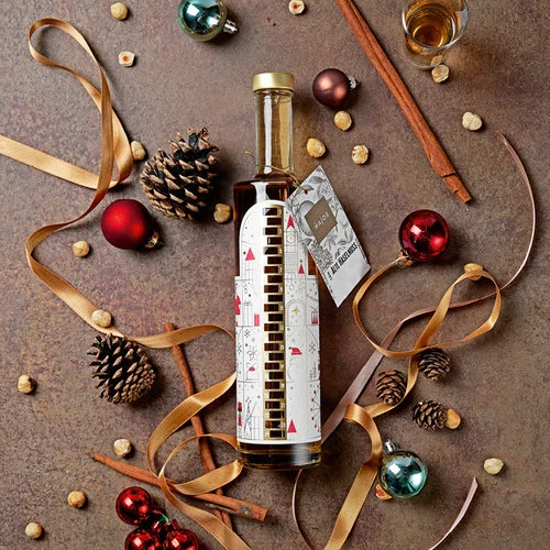 Wajos Adventskalender Flasche – gefüllt mit Alte Haselnuss Likör